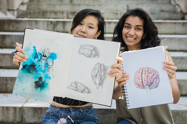 Post-baccalaureat student Viola Yu '21, left, and Sarrah Hussain '21 created hundreds of watercolors, cresyl stainings, digital art and ink drawings, as well as animations for use in the online chapters